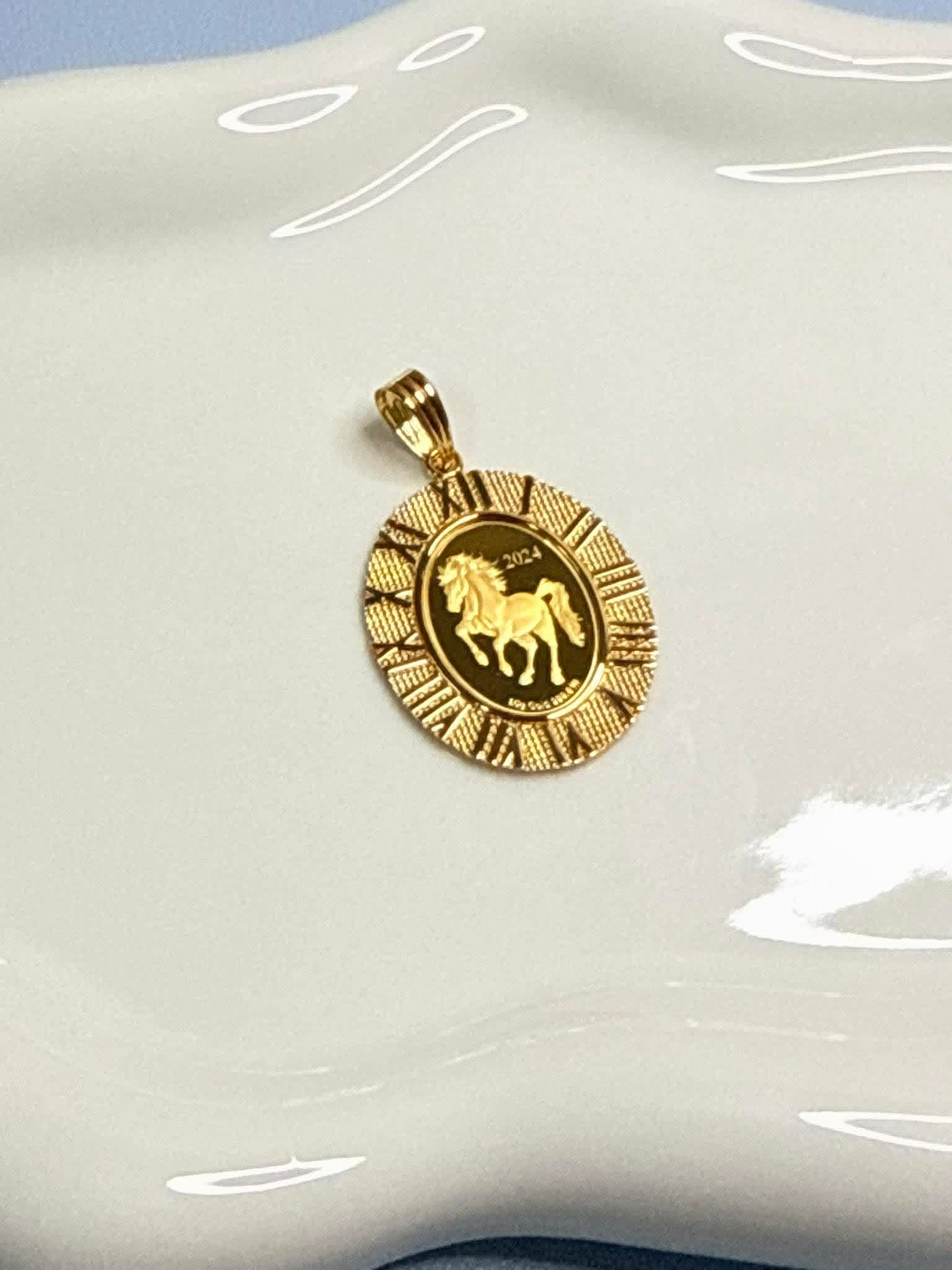 Gold horse coin pendant